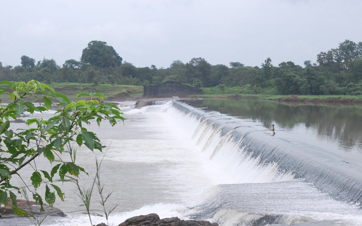 Water conservation: rainwater flowing over a check dam on the Par river at Panchlai, Valsad district, Gujarat (representative image)